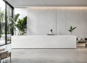 Printed quartz reception desk in a modern office lobby