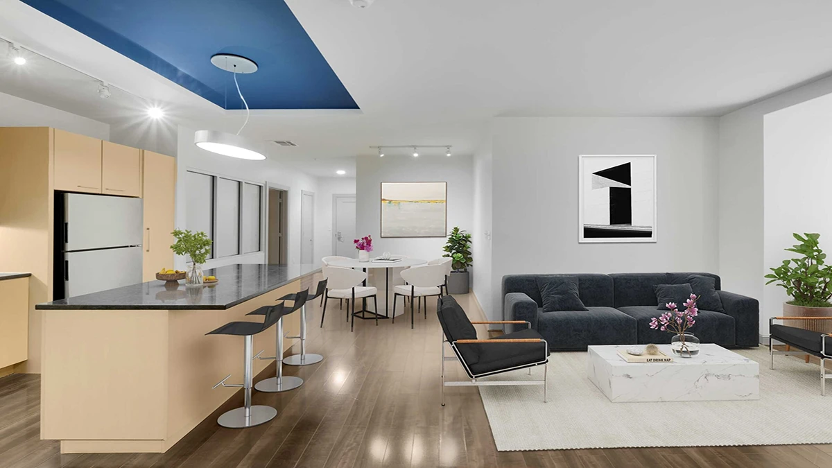Bright modern apartment living space with neutral quartz countertops, versatile designs that complement a wide range of interior styles