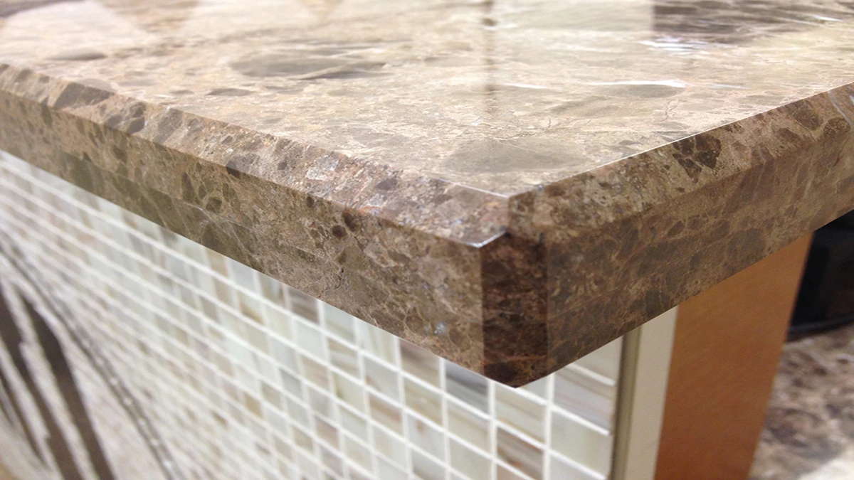 Close-up of seamless laminated/mitered quartz edge, showing thick premium profile for kitchen and bathroom countertops