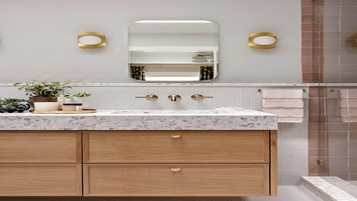 Elegant terrazzo vanity top in a modern hospitality bathroom, durable, stain-resistant, and easy to clean for hotels and residential projects