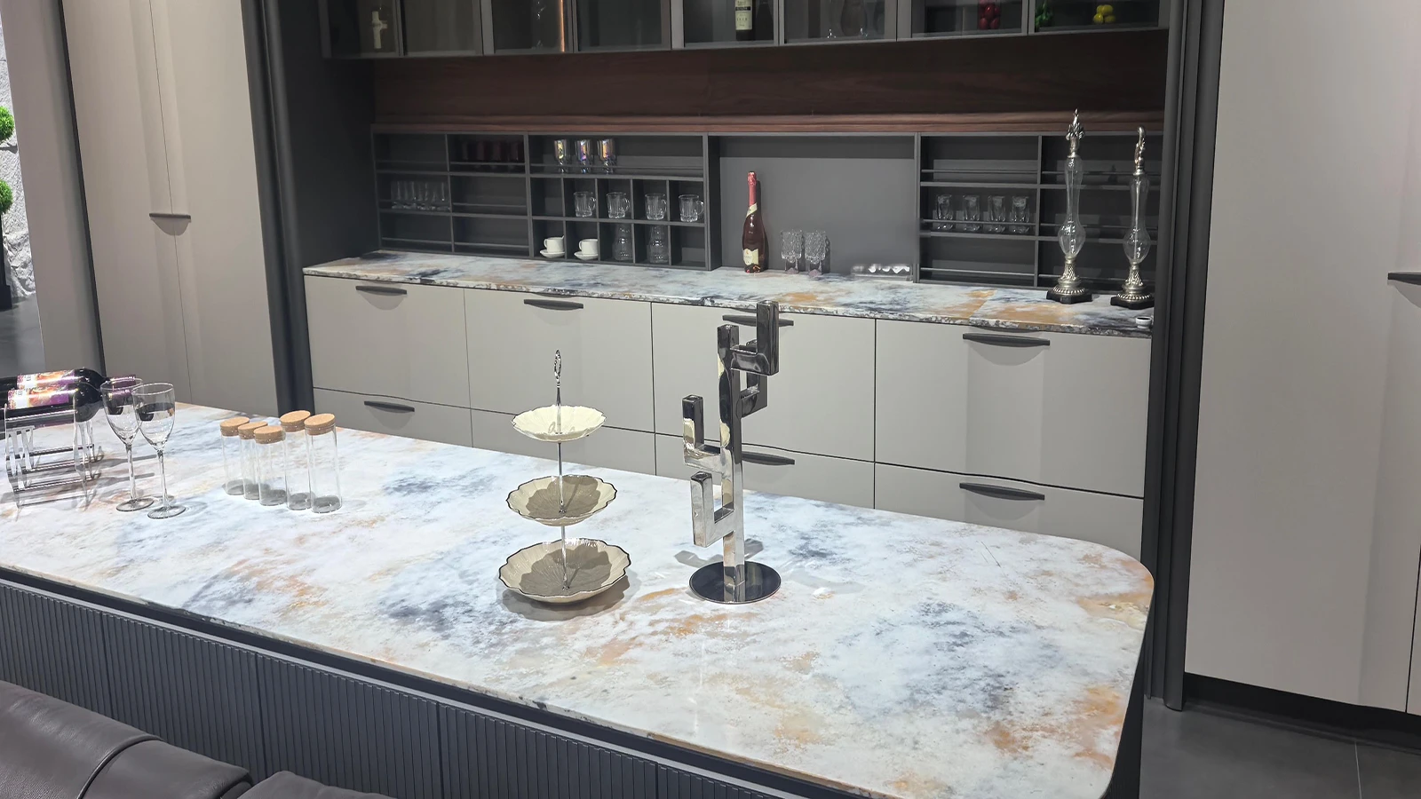 Marble-look engineered surface kitchen island illustrating AsiaQuartz silica-free and low-silica design programs