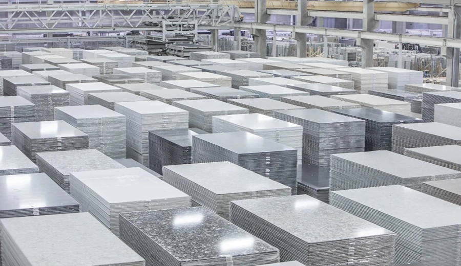 Automated quartz stone slab warehouse in China manufacturing base, showing high-volume inventory and standardized production capacity for multi-region supply programs