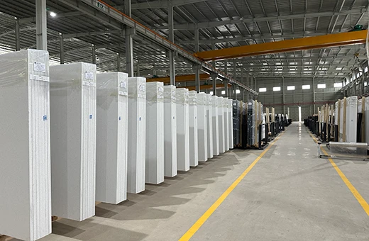 Low-silica and silica-free quartz slabs stacked in AsiaQuartz production facility, compliant with health standards