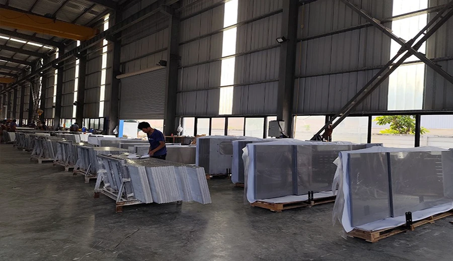 Packaged quartz slabs organized in a factory warehouse before export shipping