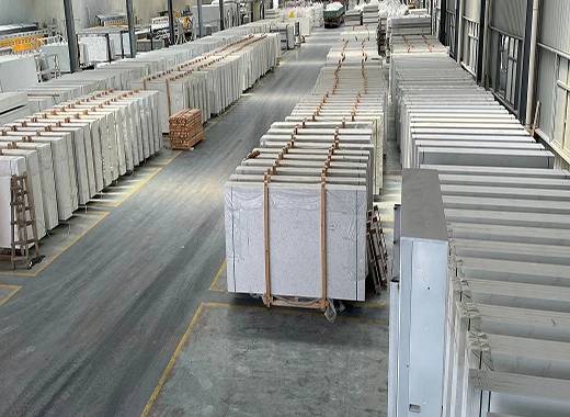 Packaged quartz slabs in factory warehouse prepared for bundle photo documentation