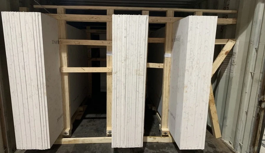 Quartz slabs secured in wooden racks for container loading and export delivery