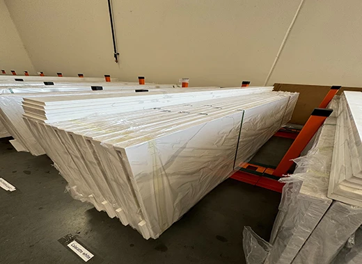 Quartz slabs wrapped and stored before container loading and securing inspection