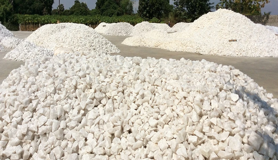 Raw quartz ore stockpile for AsiaQuartz mine-to-port quartz supply chain and B2B engineered quartz slab cost control