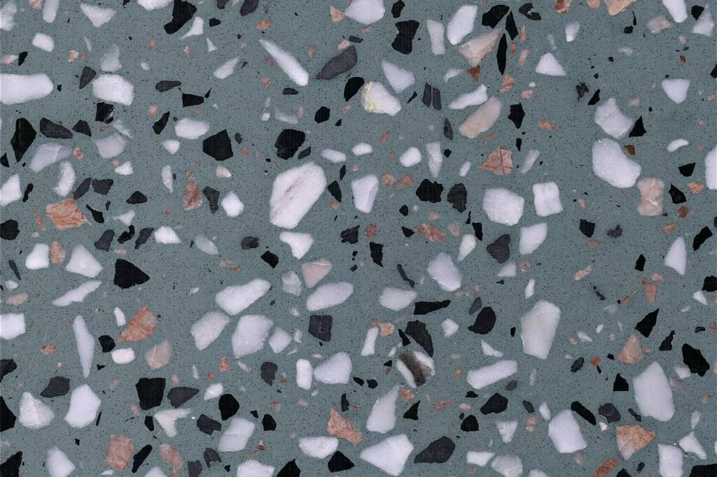 eal Rust Fleck terrazzo slab by AsiaQuartz - blue-green matrix with rust orange flecks for kitchen countertops and wall cladding