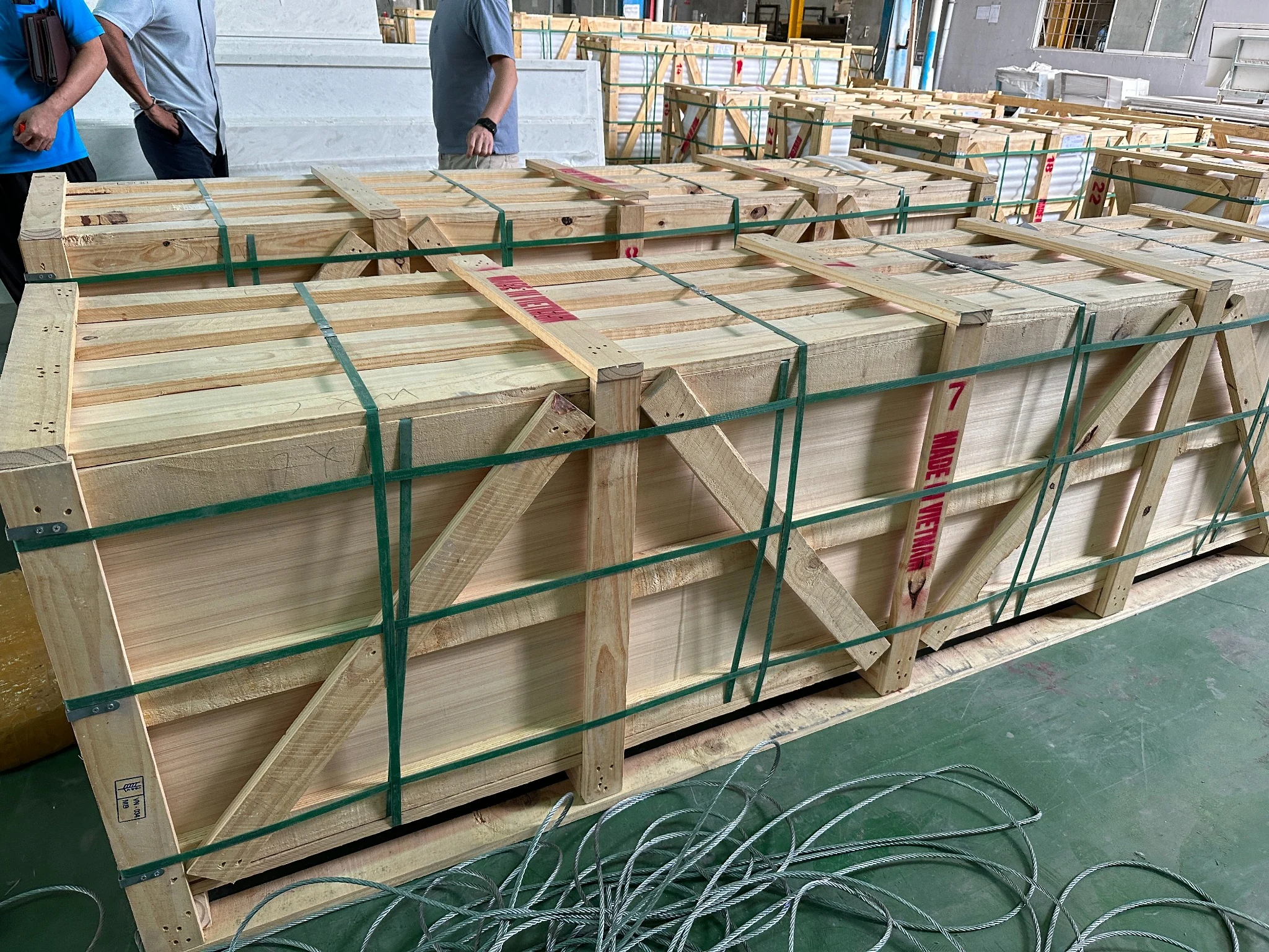 Quartz slabs with protective export packaging prepared for international shipment.