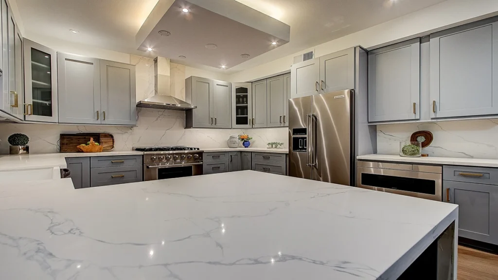 Quartz countertops in residential kitchen - light marble-look by AsiaQuartz for North American market
